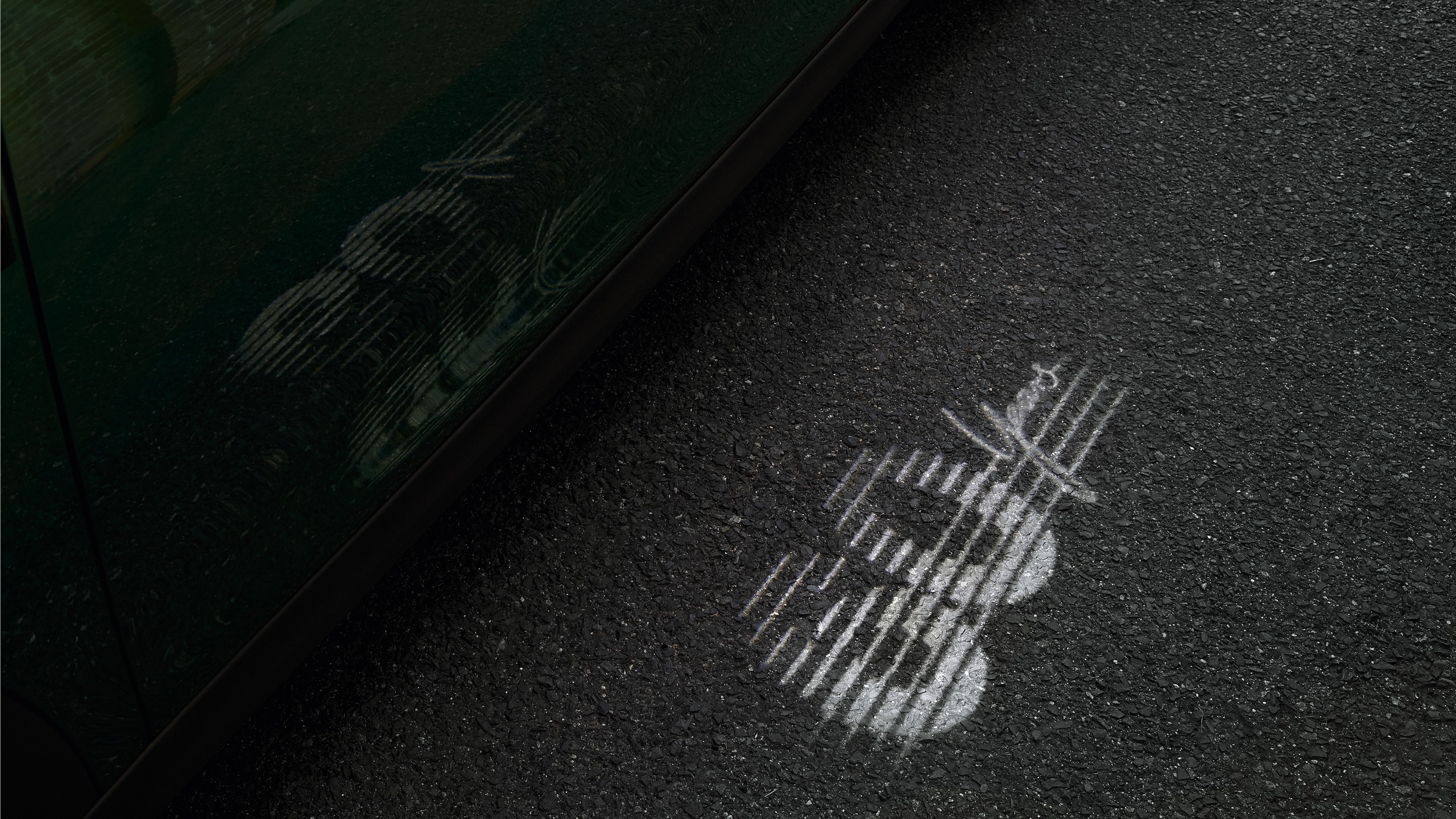 MINI Edición 60 Aniversario – insignia – proyección del logotipo